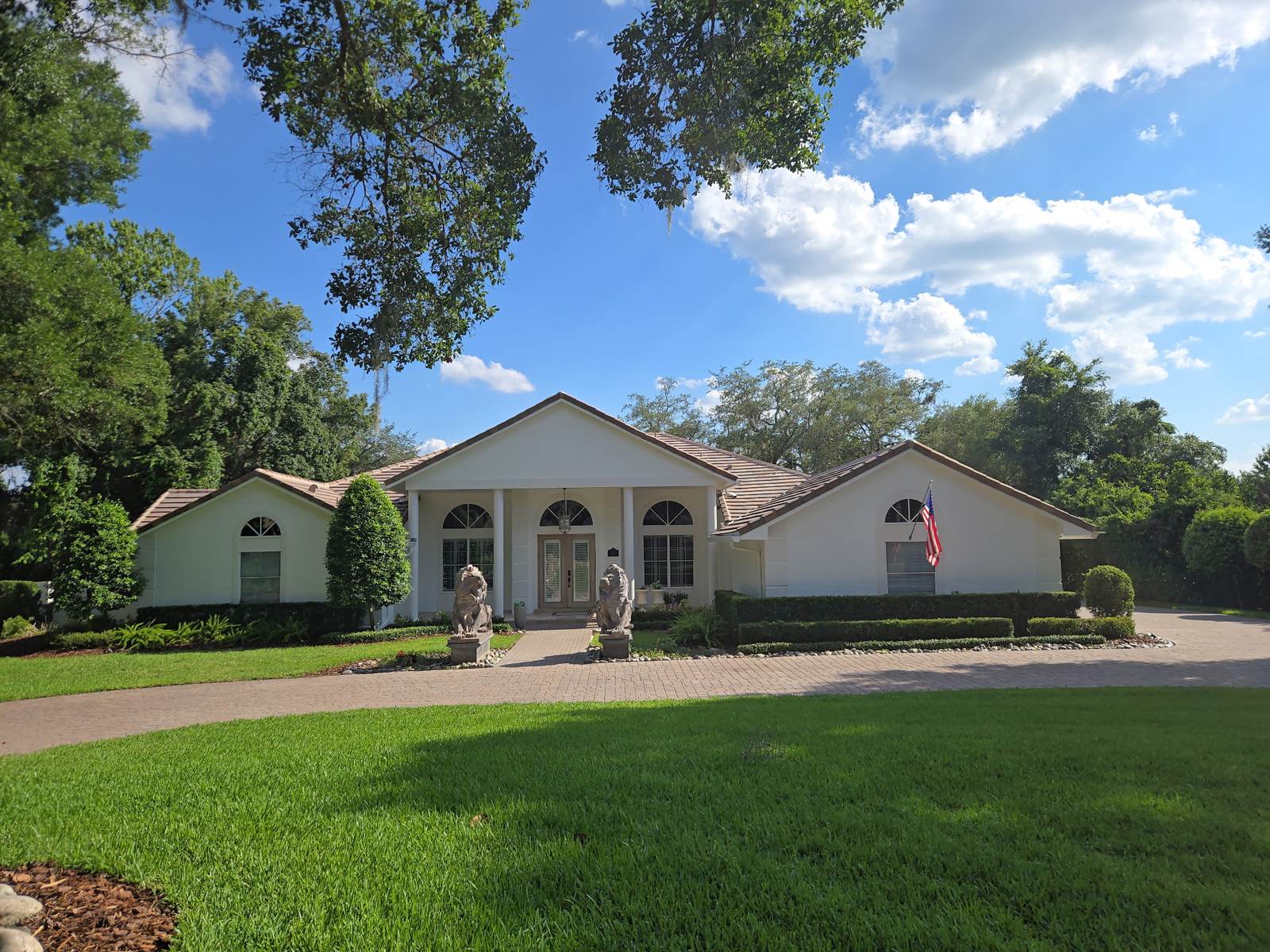 Freshly painted Florida estate home with tile roof