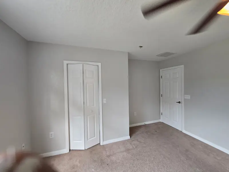 Bedroom walls, doors and trim finished and move-in ready