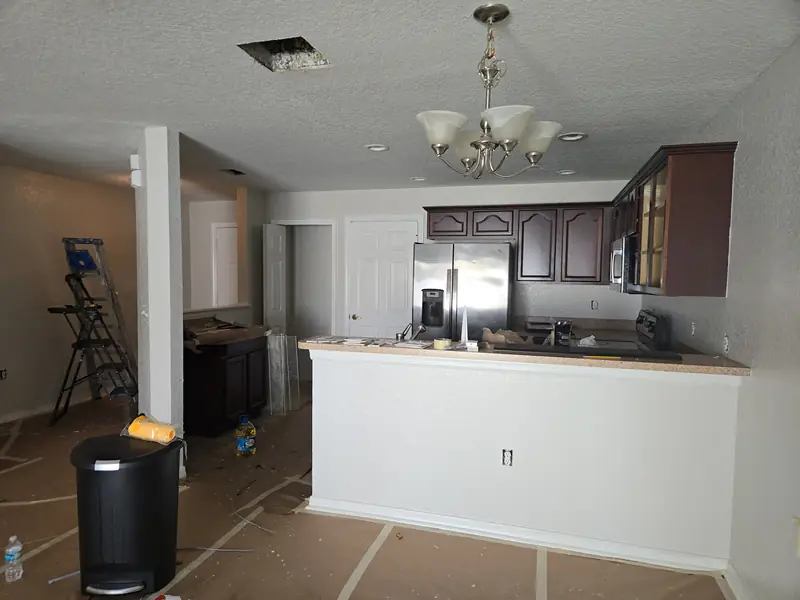 Kitchen and dining area, freshly painted and move-in ready