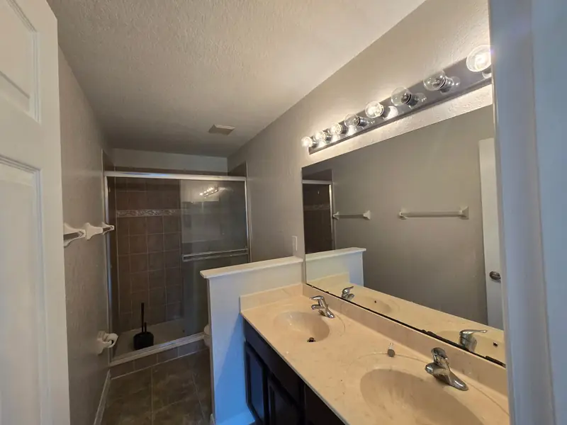 Primary bath repainted around the double vanity